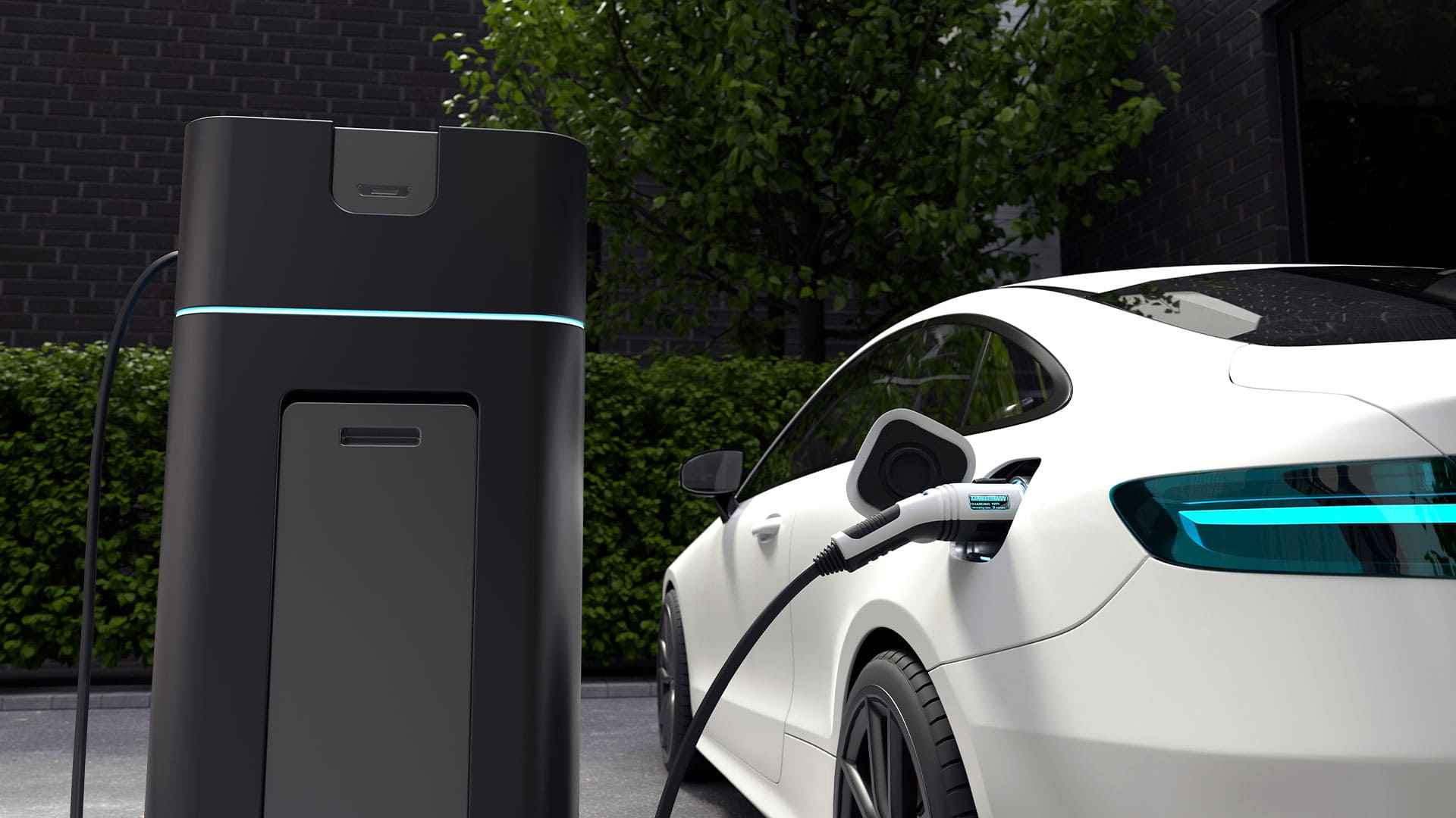 Coche eléctrico conectado a un punto de recarga mientras destaca por su conducción eficiente y tecnología avanzada.